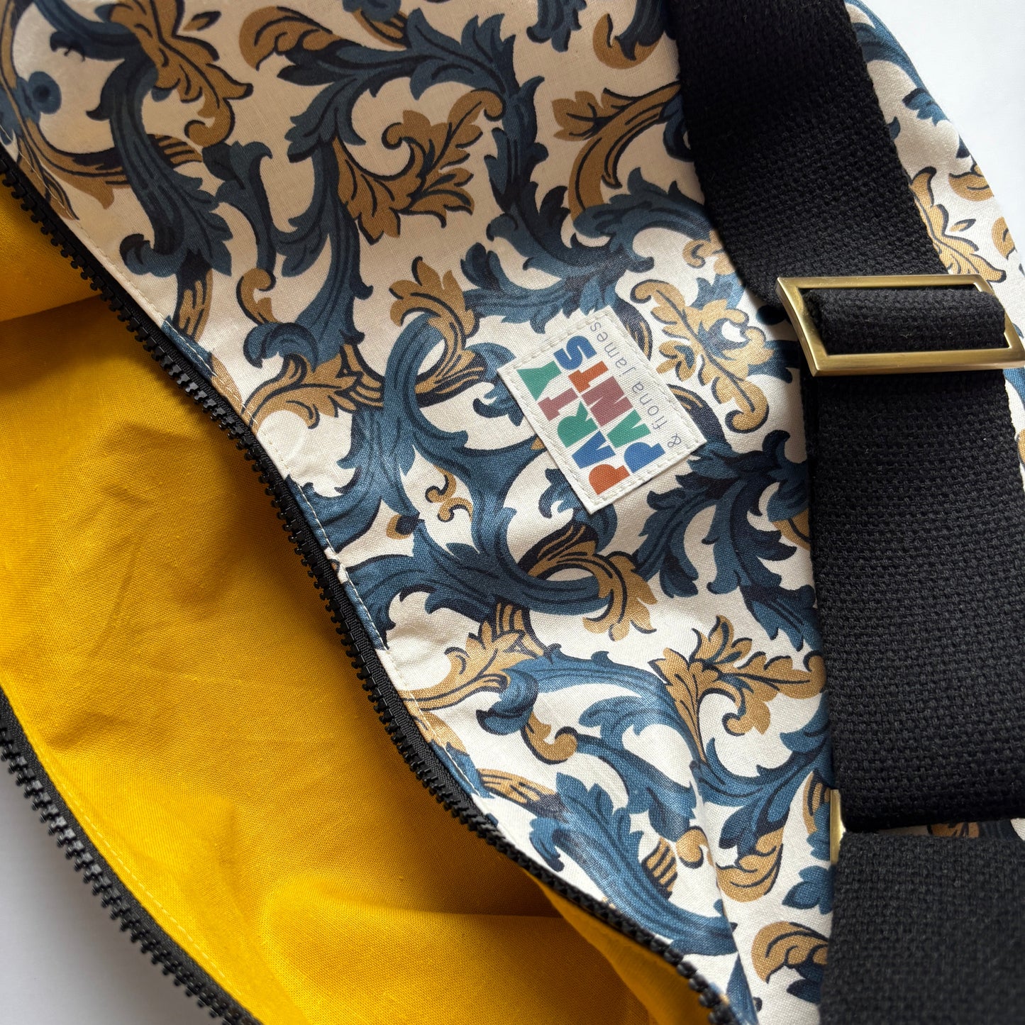 Blue and gold paisley moon bag