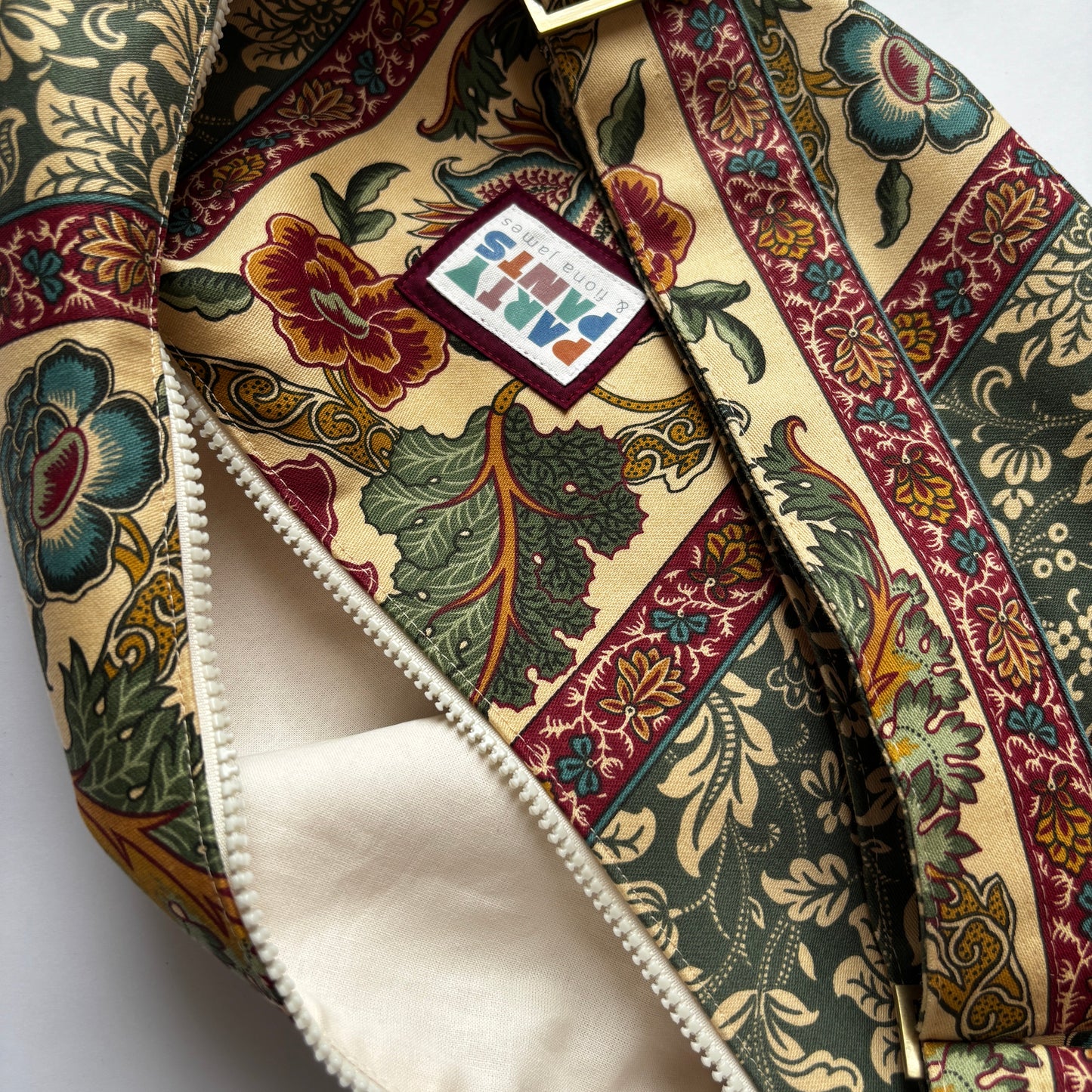 Green and burgundy floral stripe moon bag