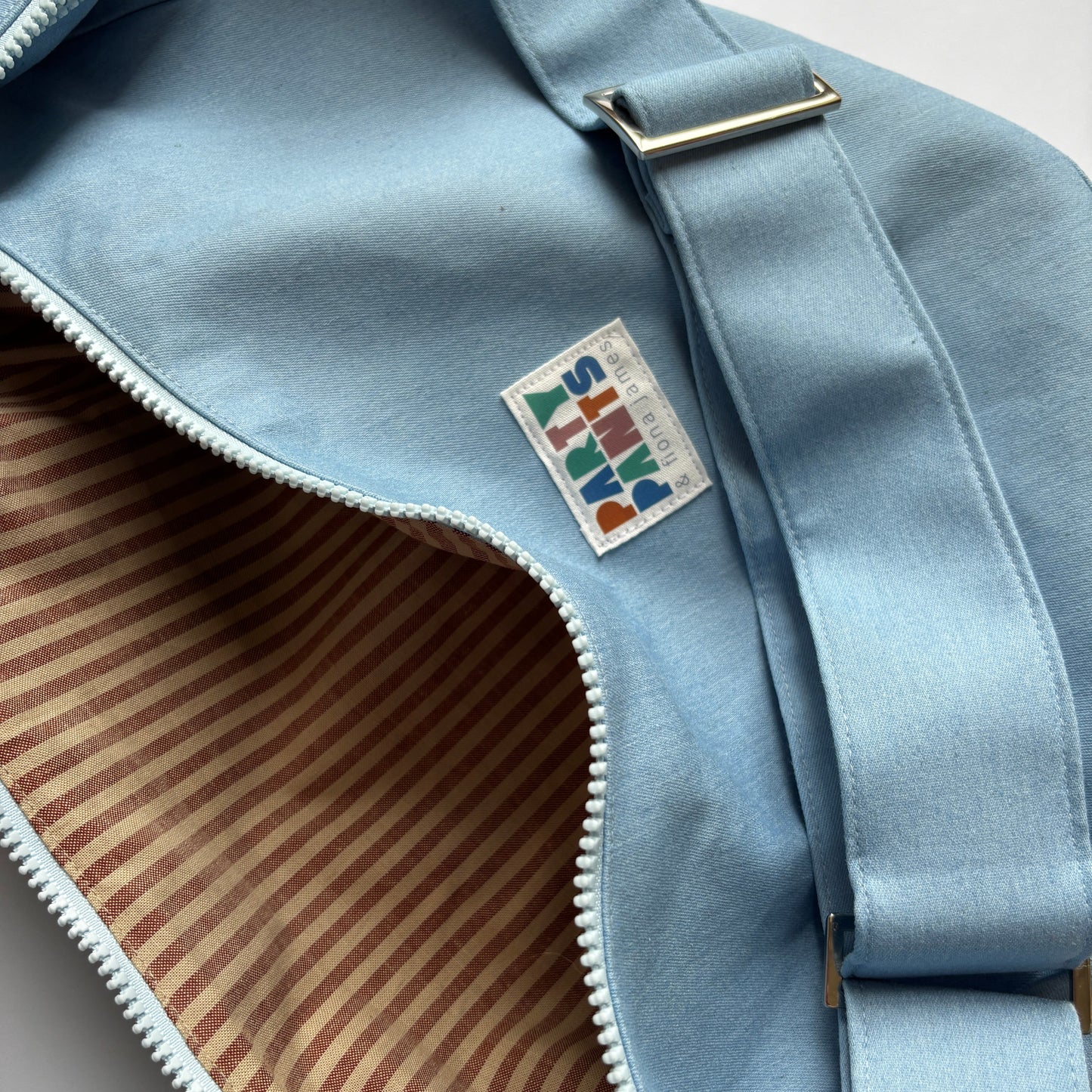 Light blue denim moon bag