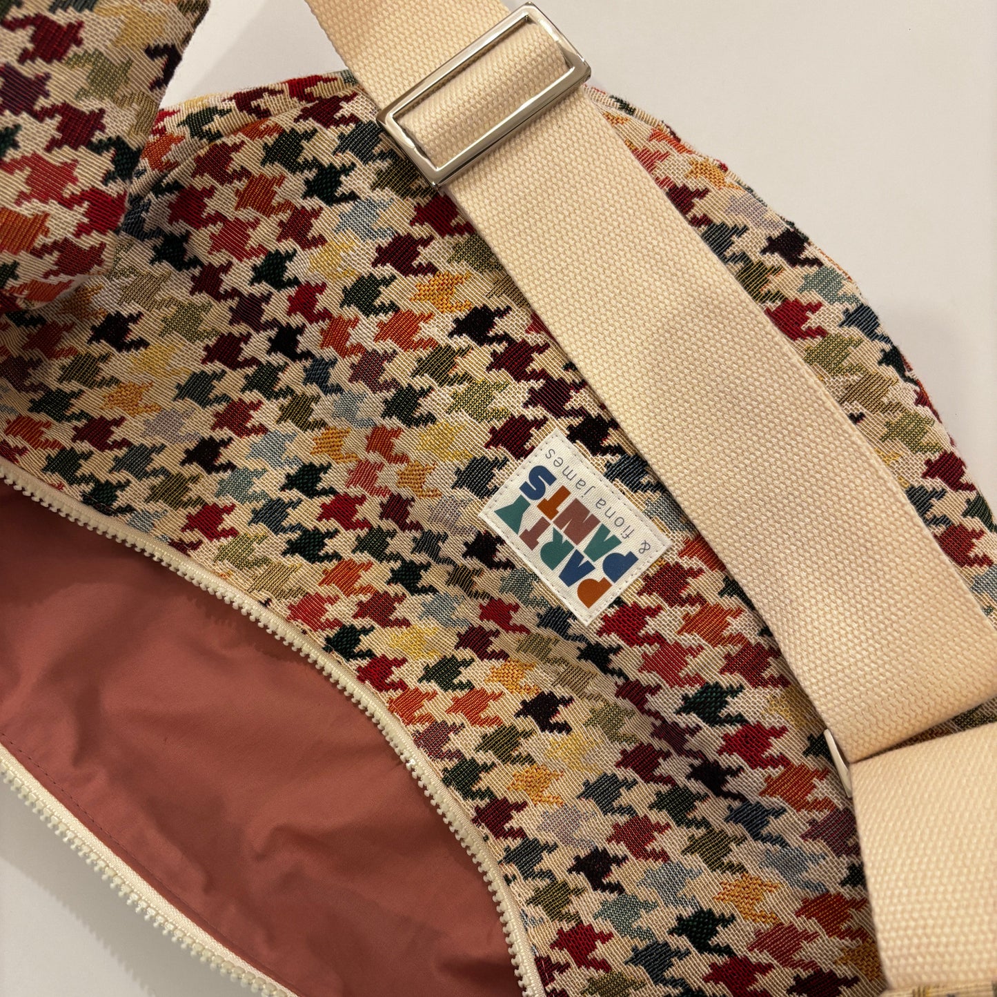 Multicoloured dogtooth moon bag