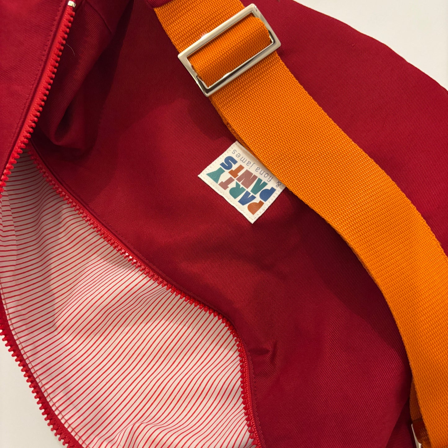 Red and orange moon bag