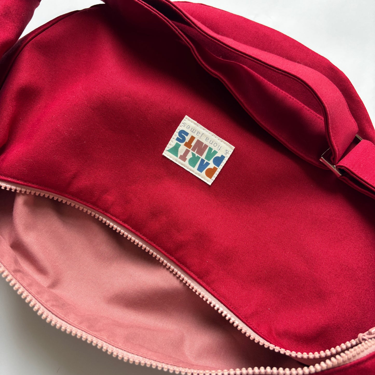 Red and pink moon bag