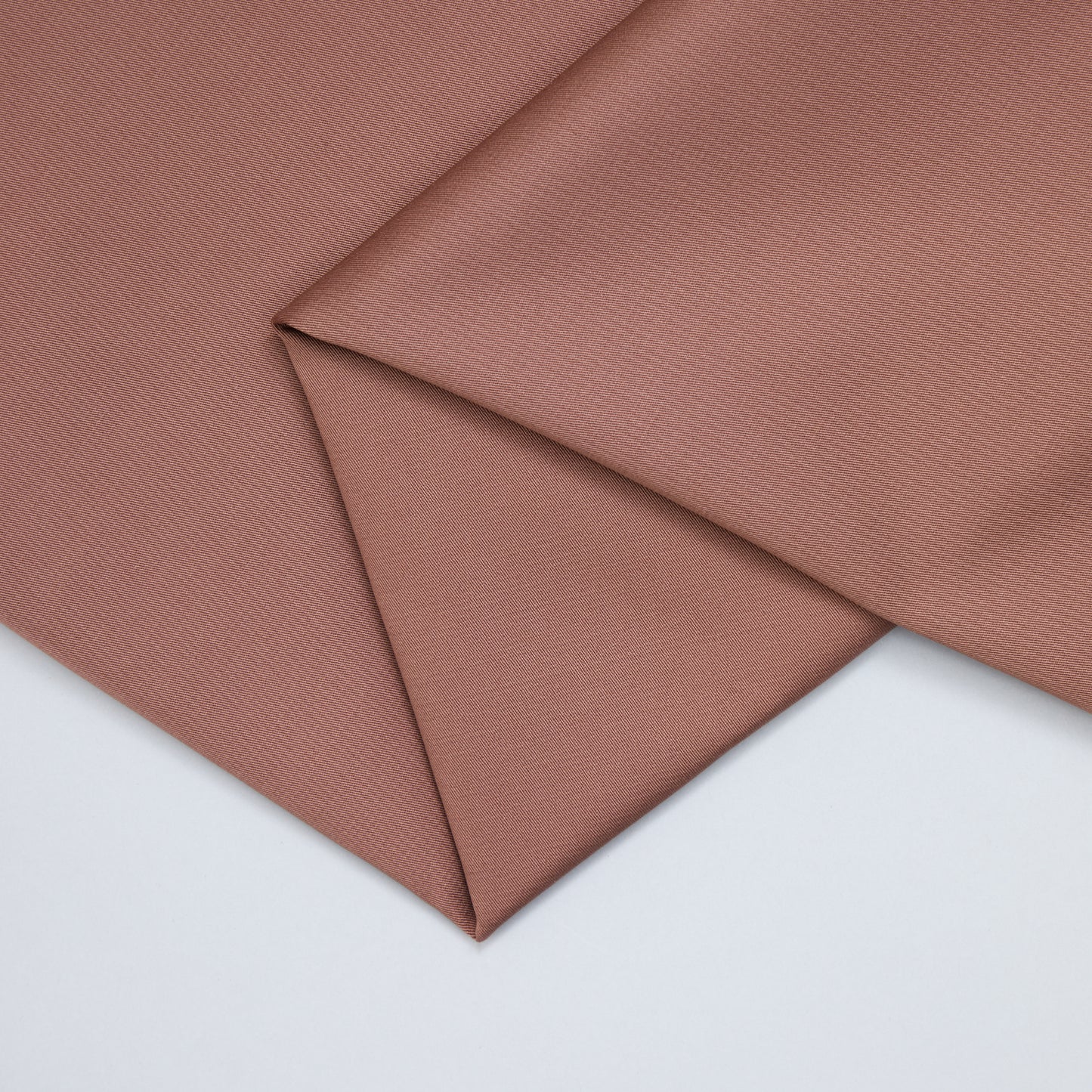 A photo of the pink twill fabric used for our 'Worth the tassel' Party Pants