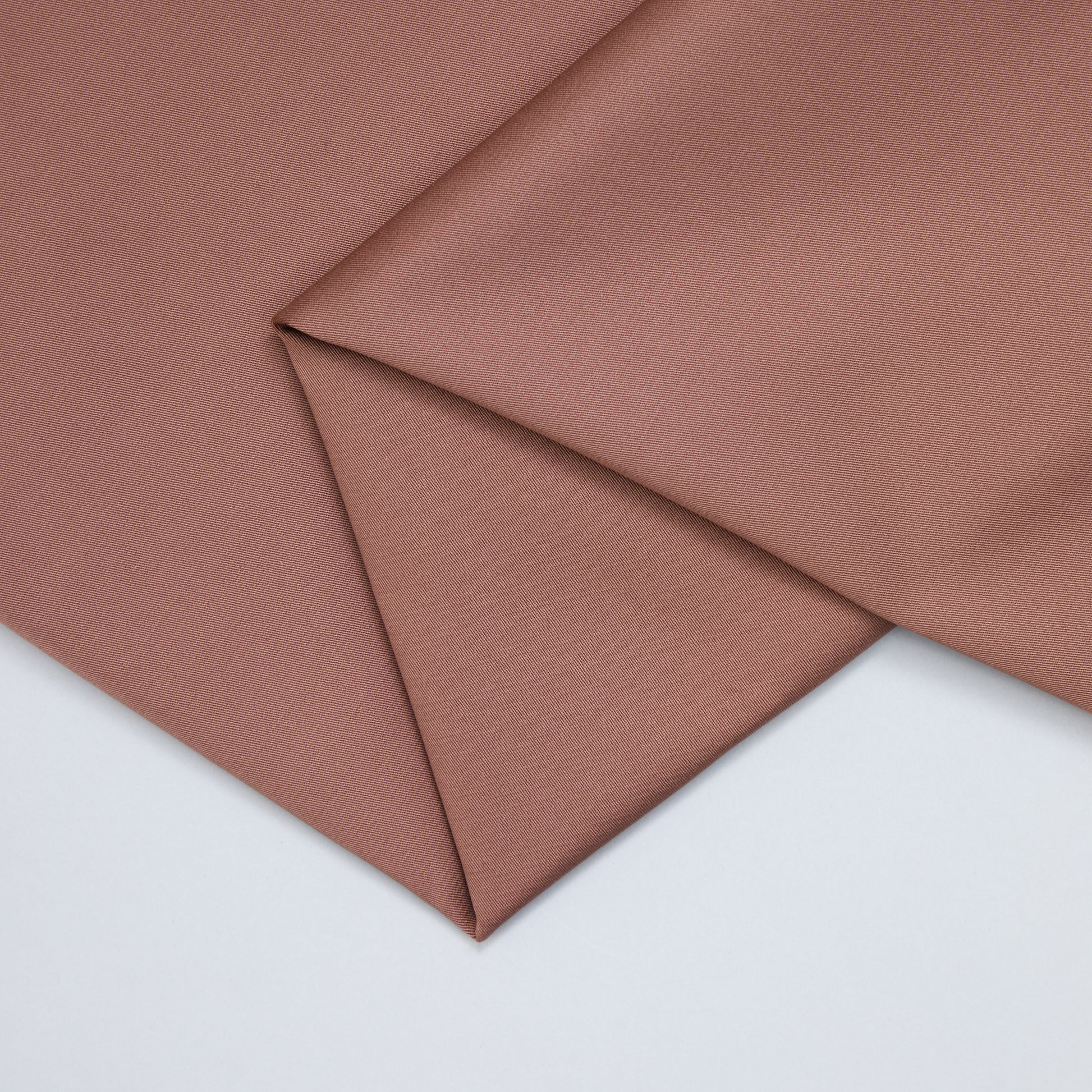 A photo of the pink twill fabric used for our 'Worth the tassel' Party Pants