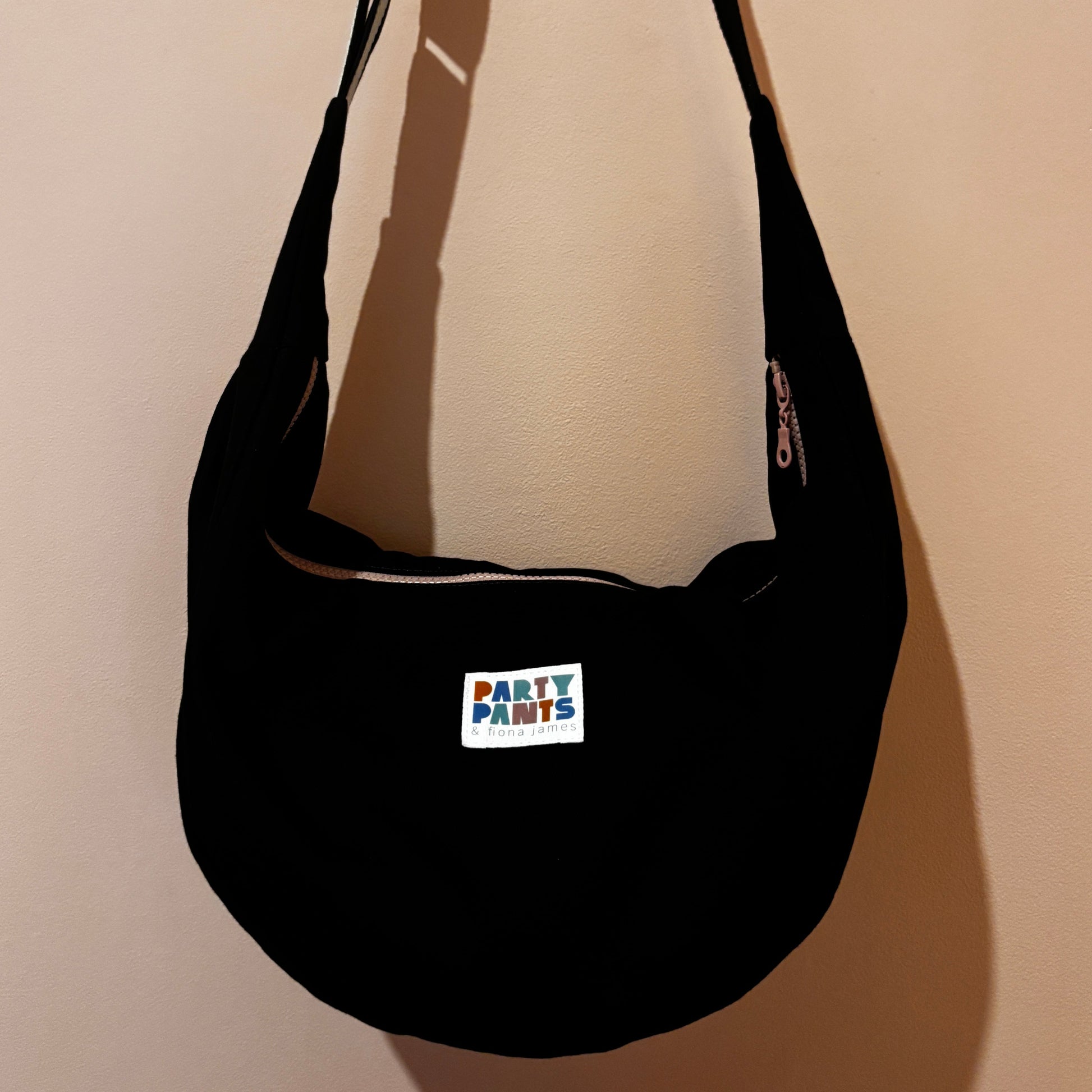 Black and pink moon bag