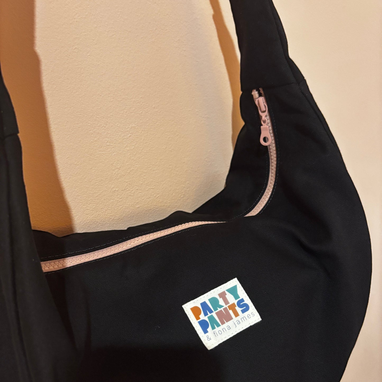 Black and pink moon bag