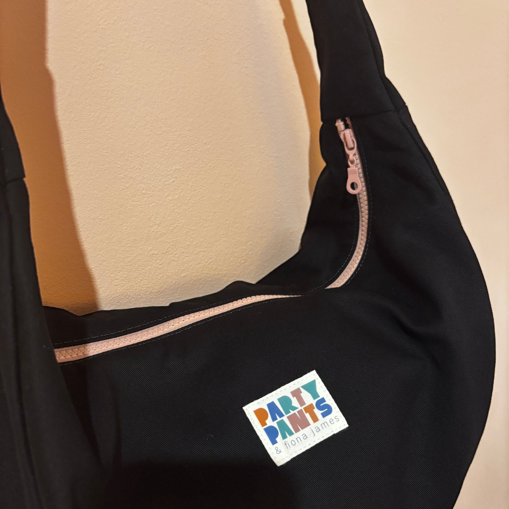 Black and pink moon bag