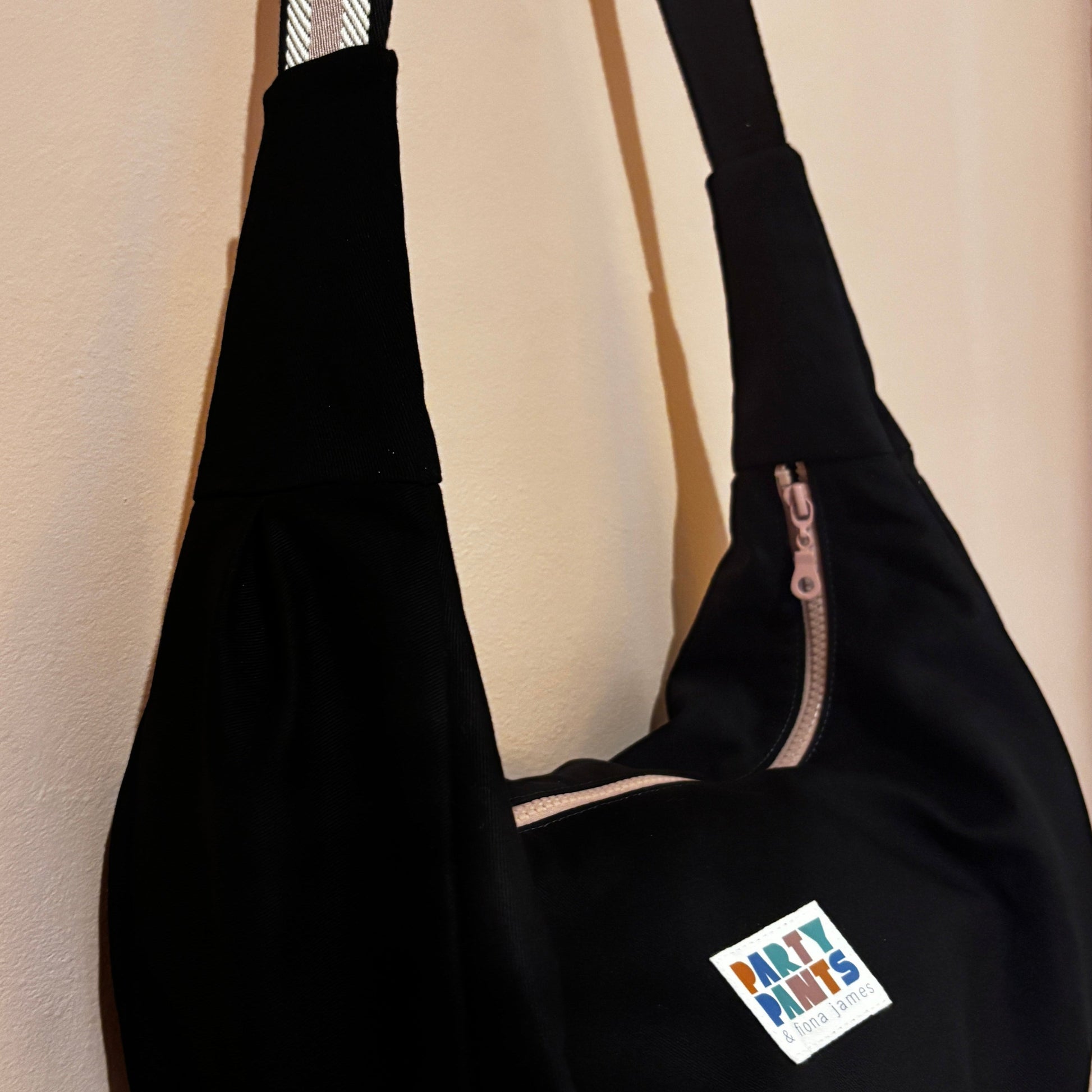 Black and pink moon bag
