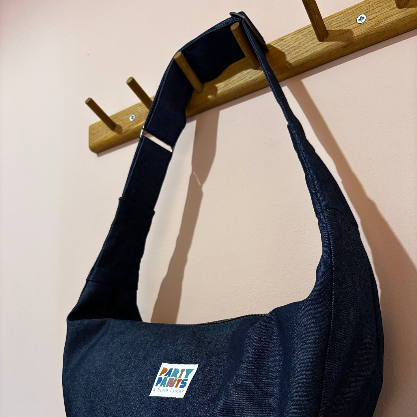 Dark blue denim moon bag