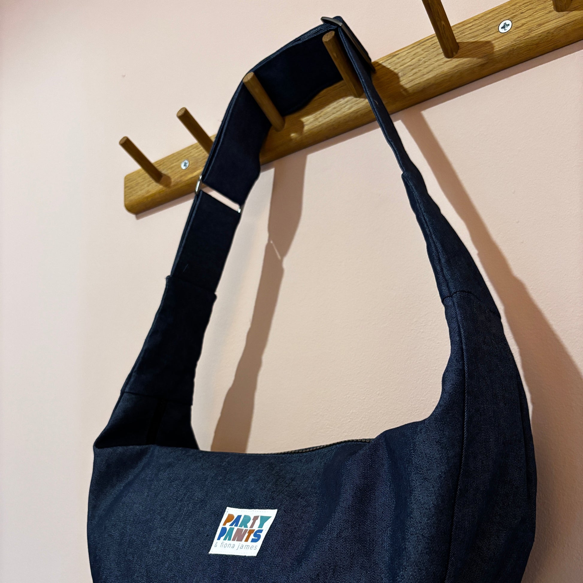 Dark blue denim moon bag