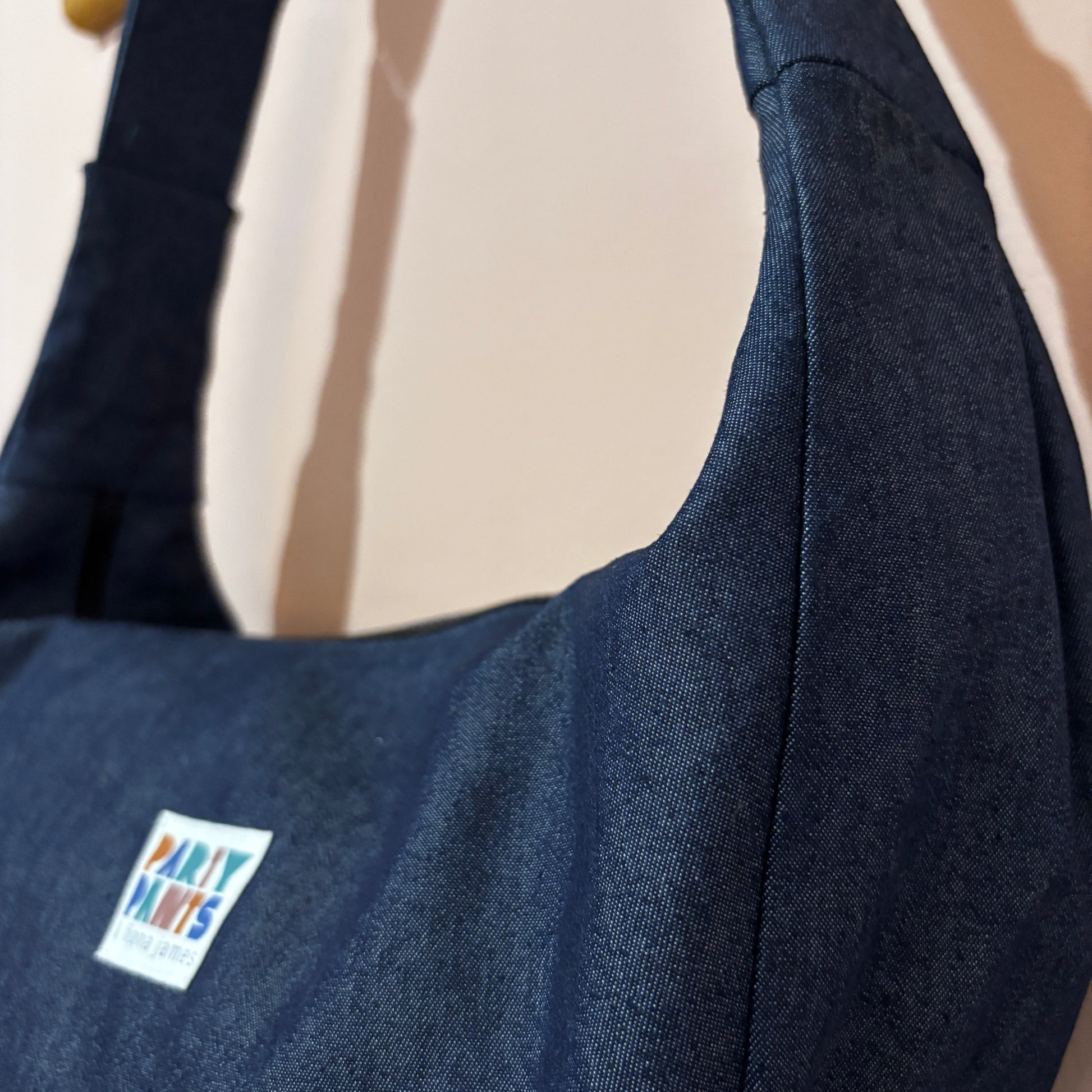 Dark blue denim moon bag