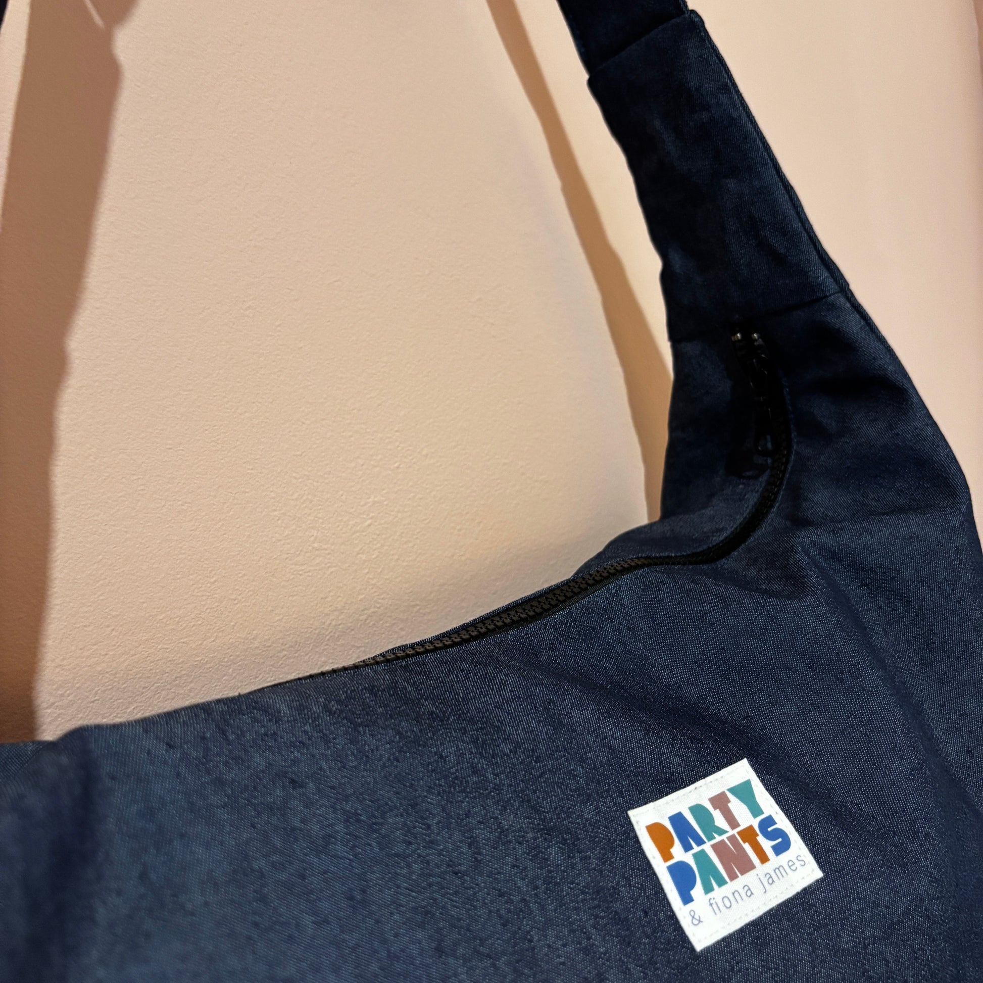 Dark blue denim moon bag