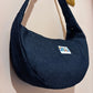 Dark blue denim moon bag