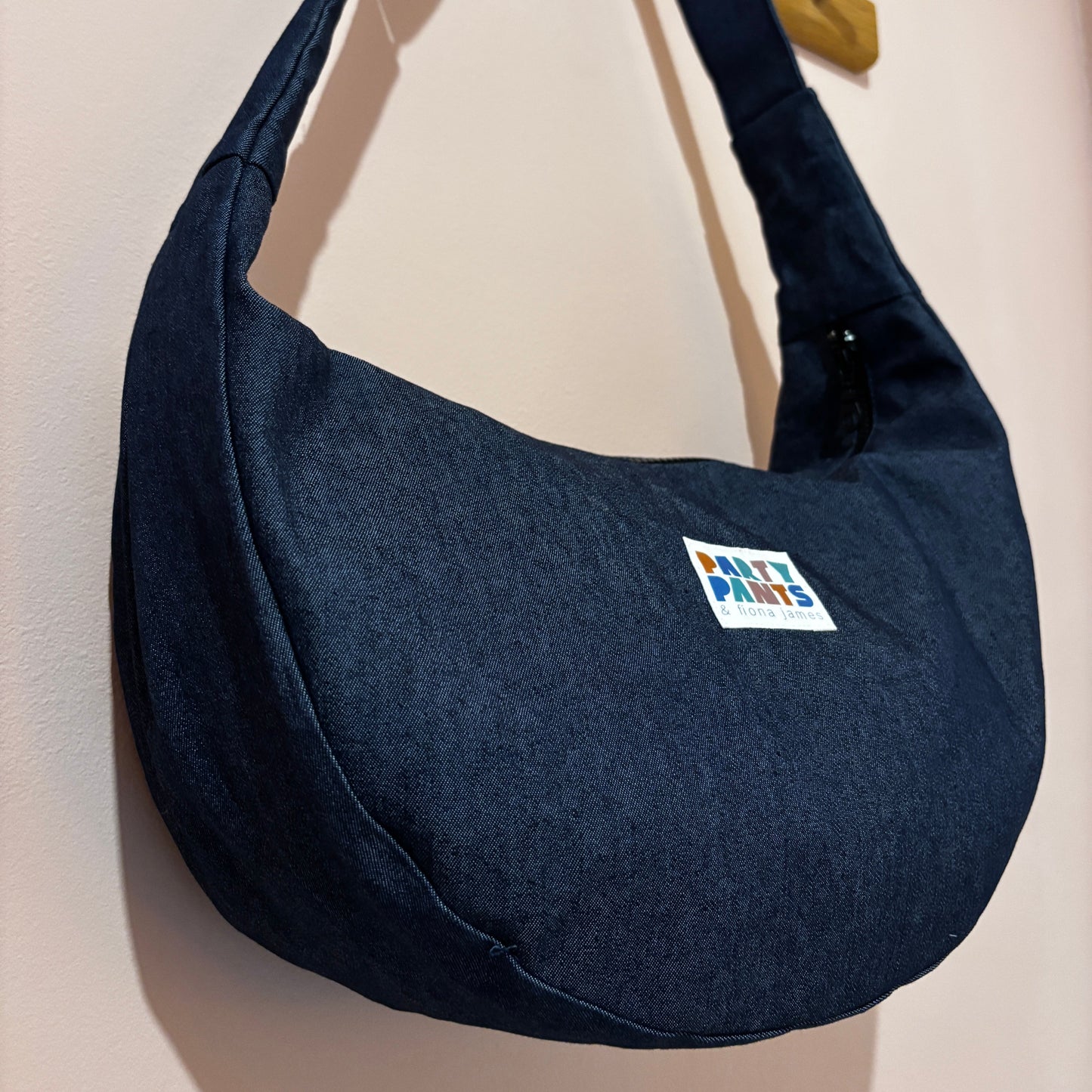 Dark blue denim moon bag