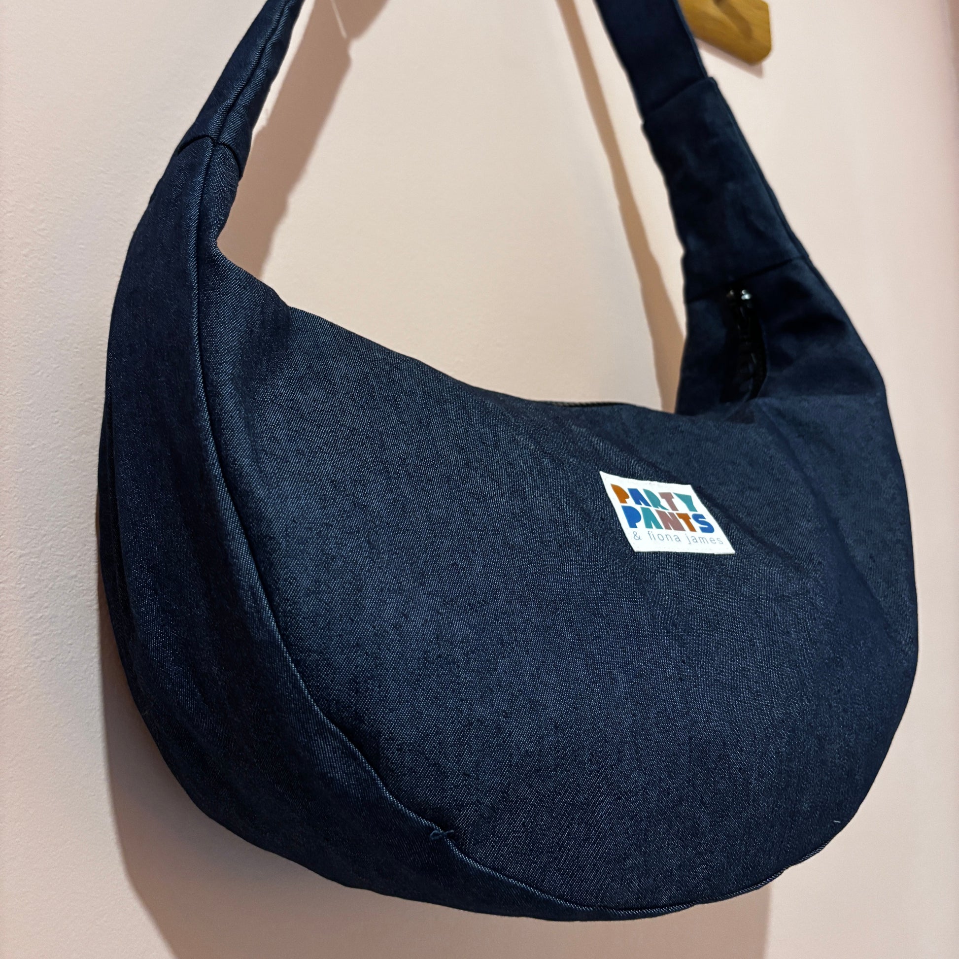Dark blue denim moon bag