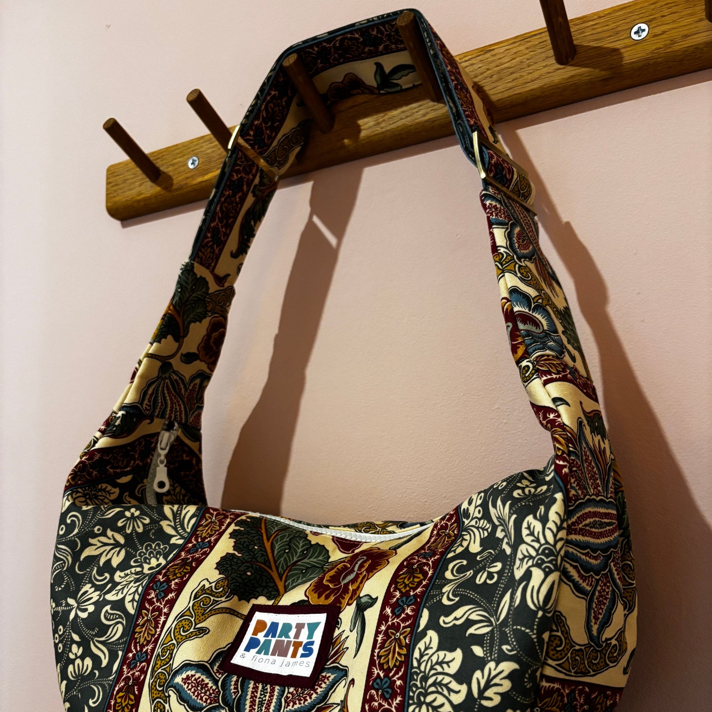 Green and burgundy floral stripe moon bag