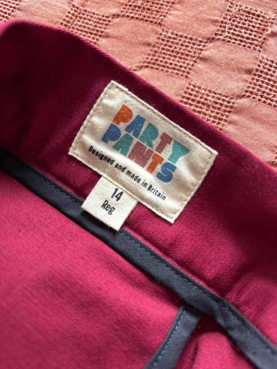 Red trousers with frill 14