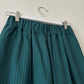 Green stripe trousers with pom poms 12