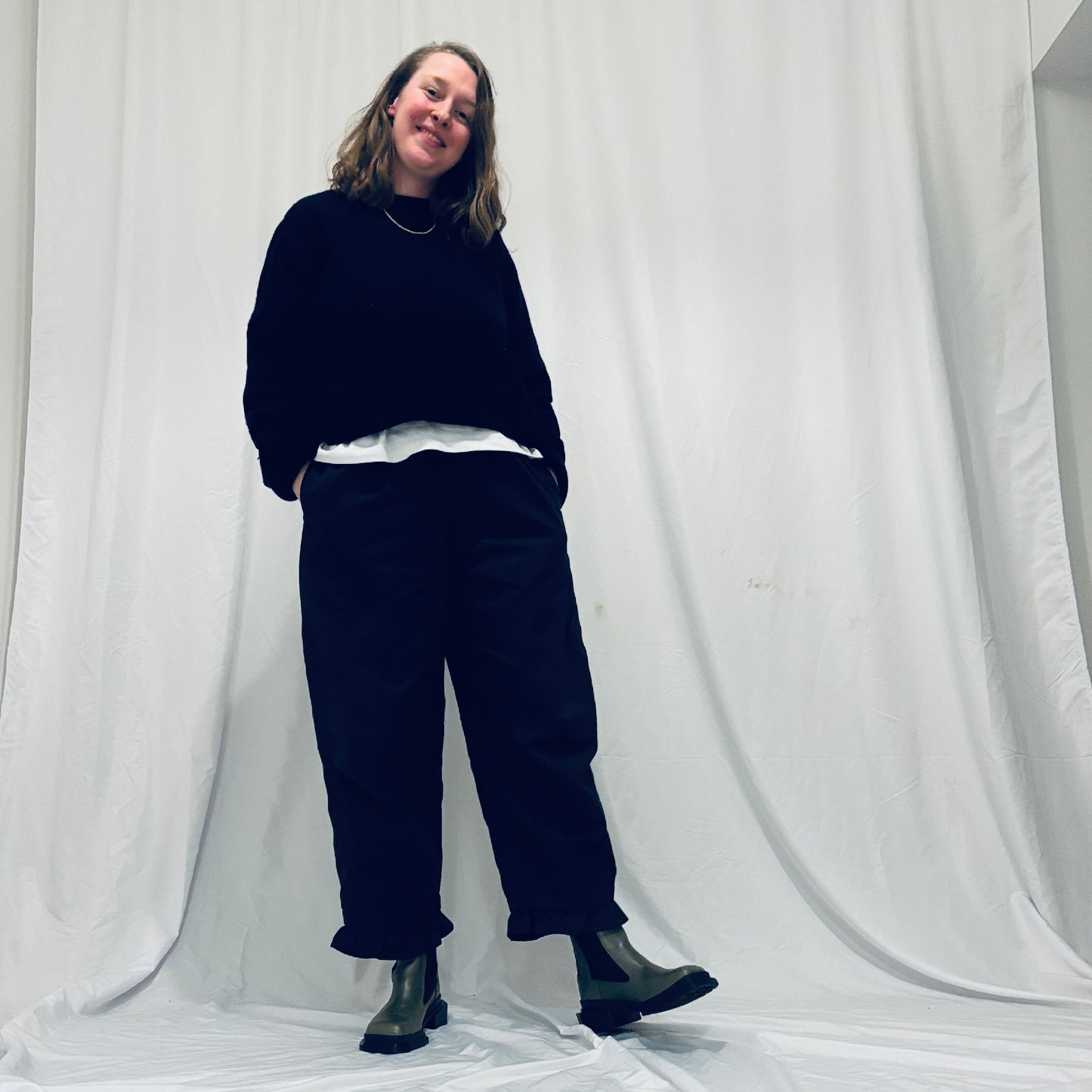 Navy barrel-leg trousers with frill