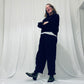 Navy barrel-leg trousers with frill