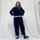 Navy barrel-leg trousers with frill