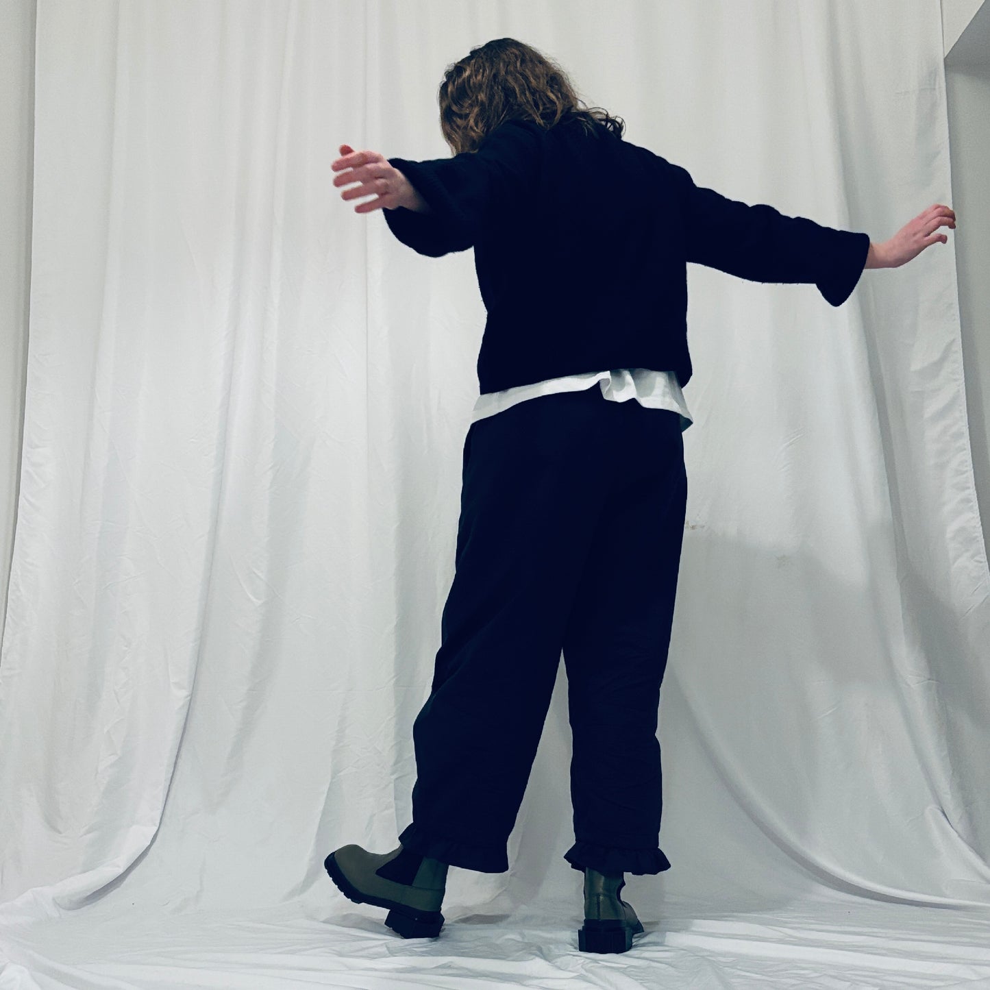 Navy barrel-leg trousers with frill