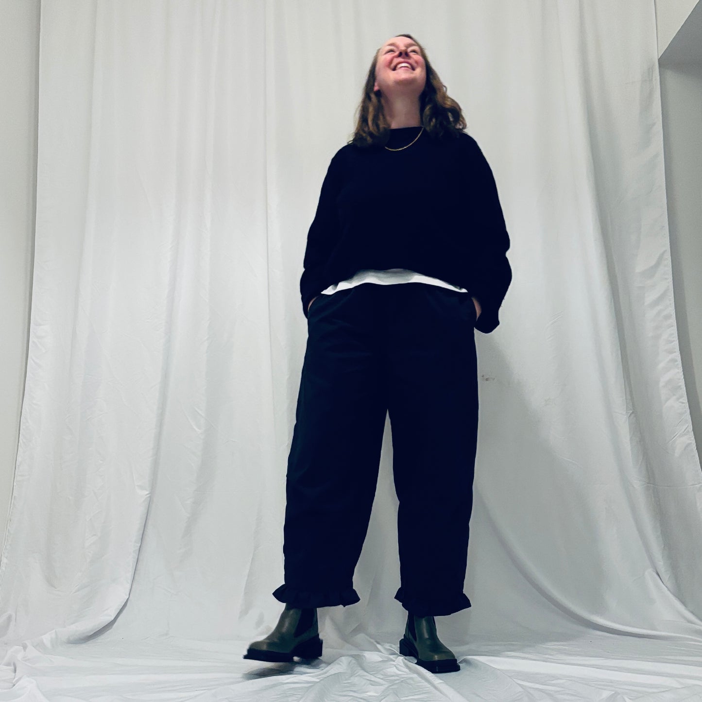 Navy barrel-leg trousers with frill