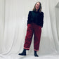 Red barrel-leg trousers with pink zig zags