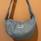 Light blue denim moon bag