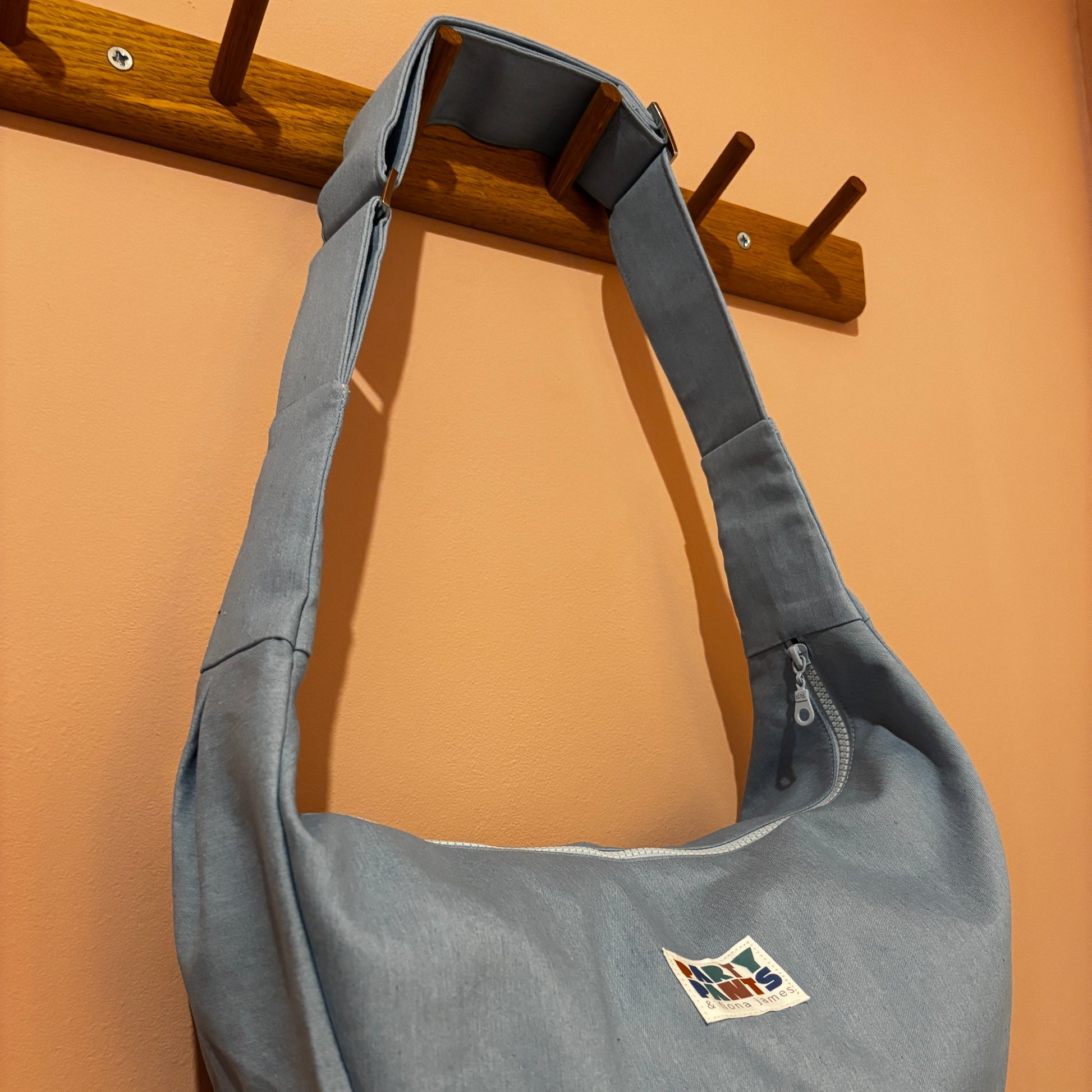 Light blue denim moon bag
