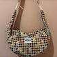 Multicoloured dogtooth moon bag