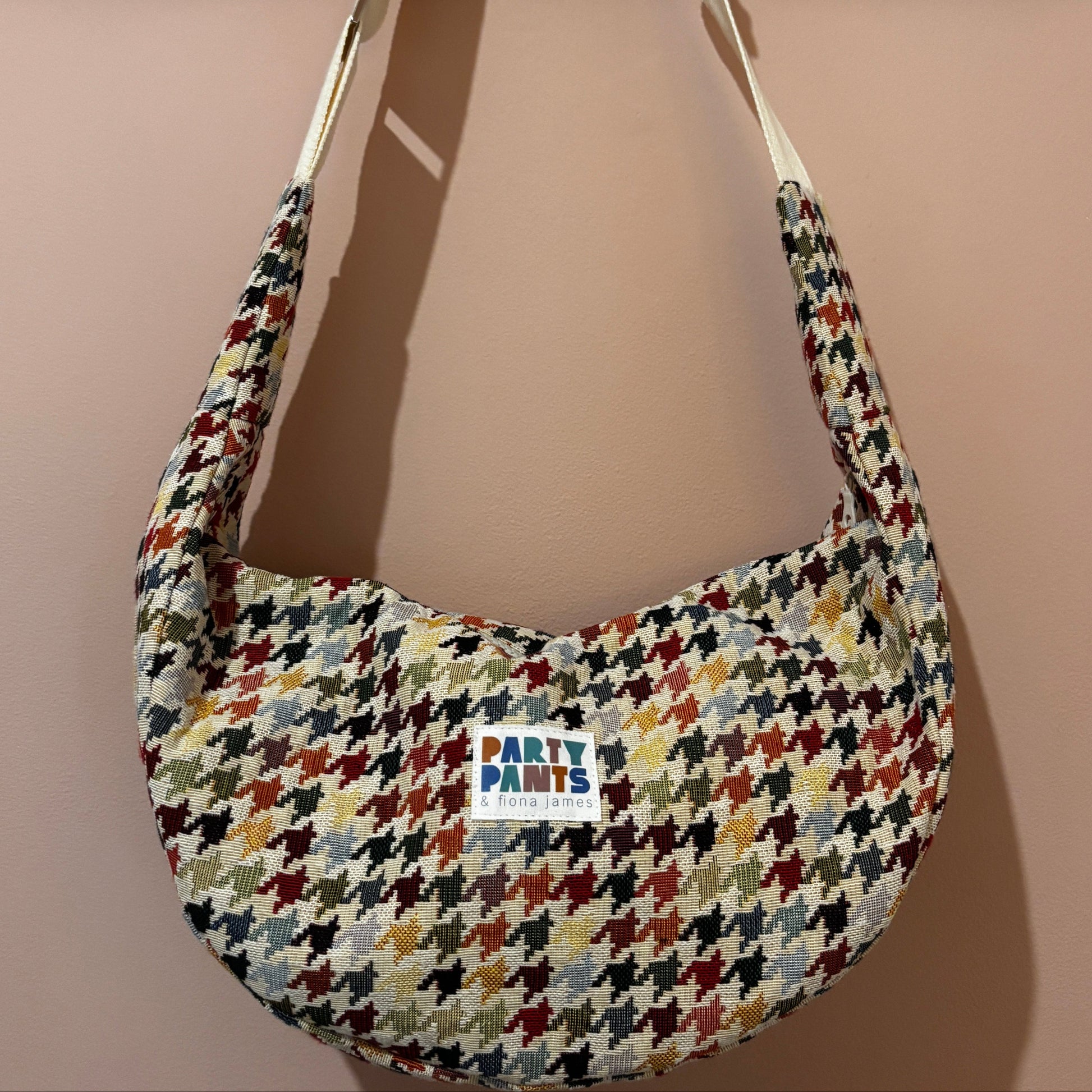 Multicoloured dogtooth moon bag