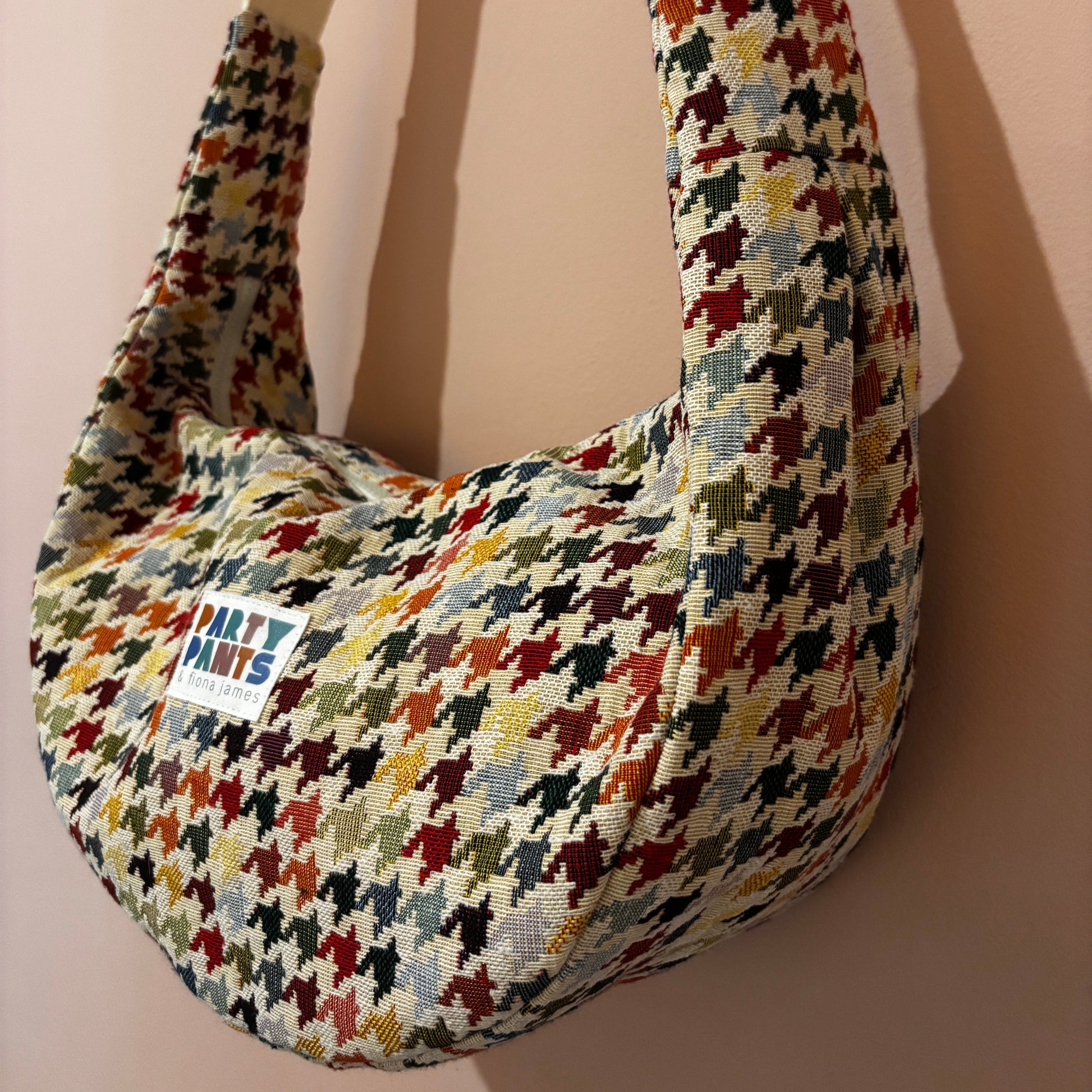 Multicoloured dogtooth moon bag