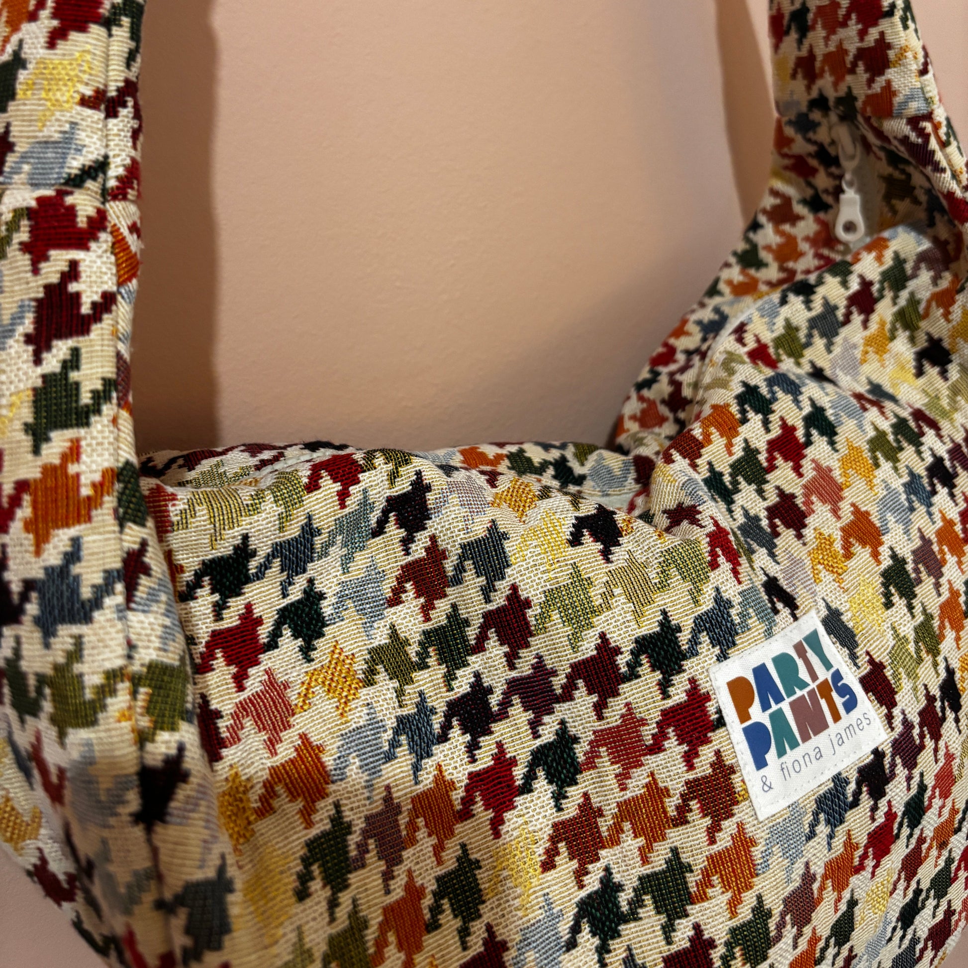 Multicoloured dogtooth moon bag