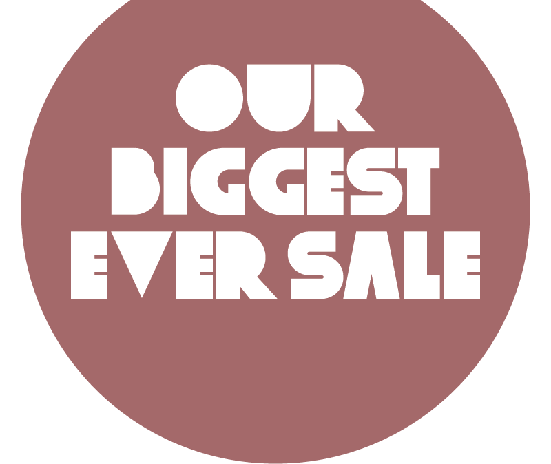 A pink circle with text overlay reading "Our biggest sale ever"