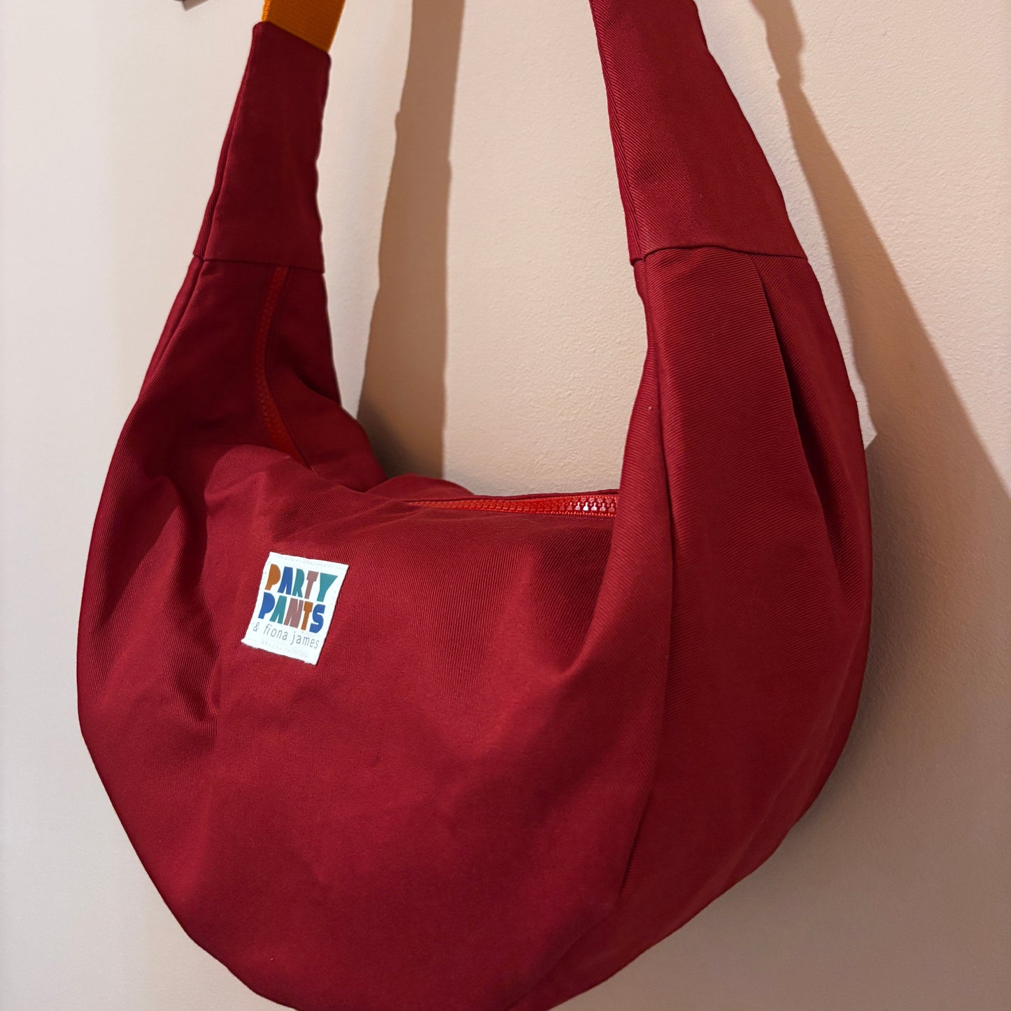 Red and orange moon bag