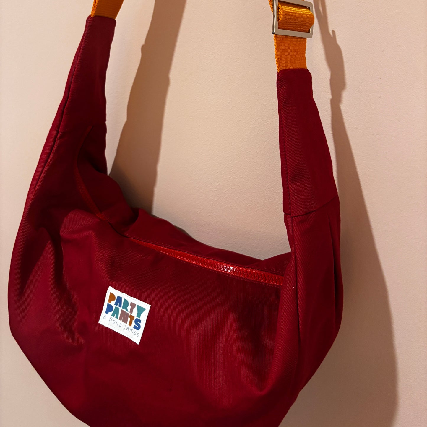 Red and orange moon bag