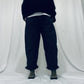 Navy barrel-leg trousers with frill